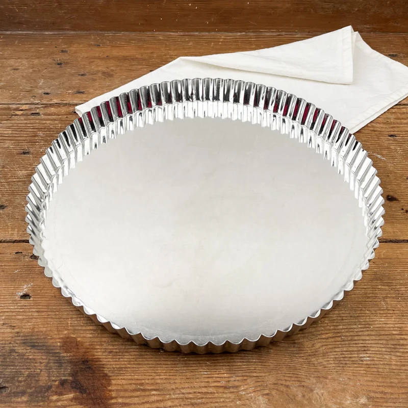 Tourtière en fer blanc