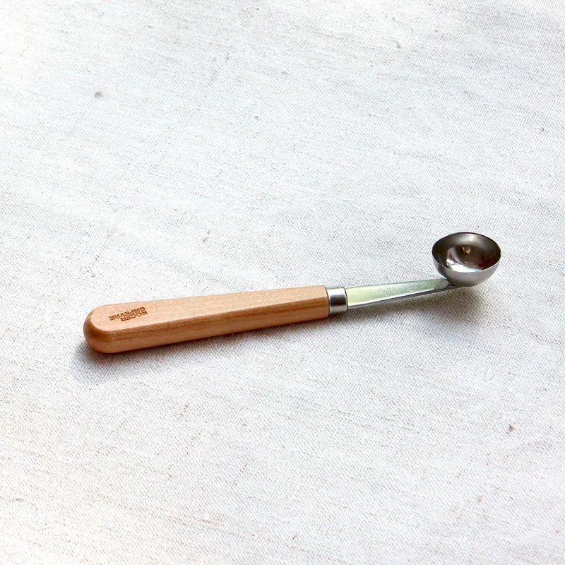 Cuillère à melon en inox manche en olivier