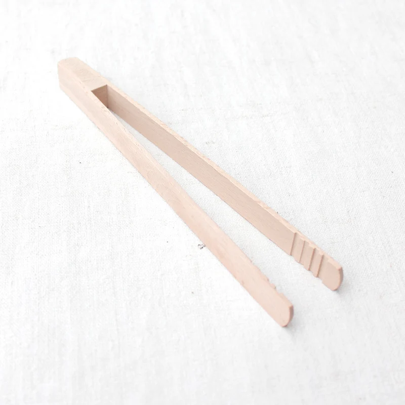 Pince à toast en bois