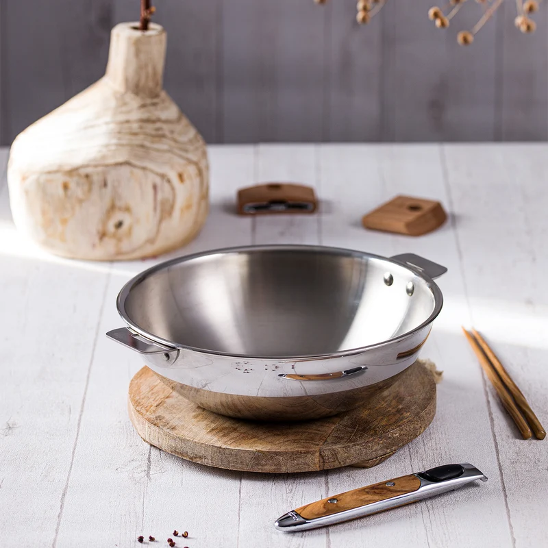 Wok inox Casteline amovible - Cuisson rapide en induction